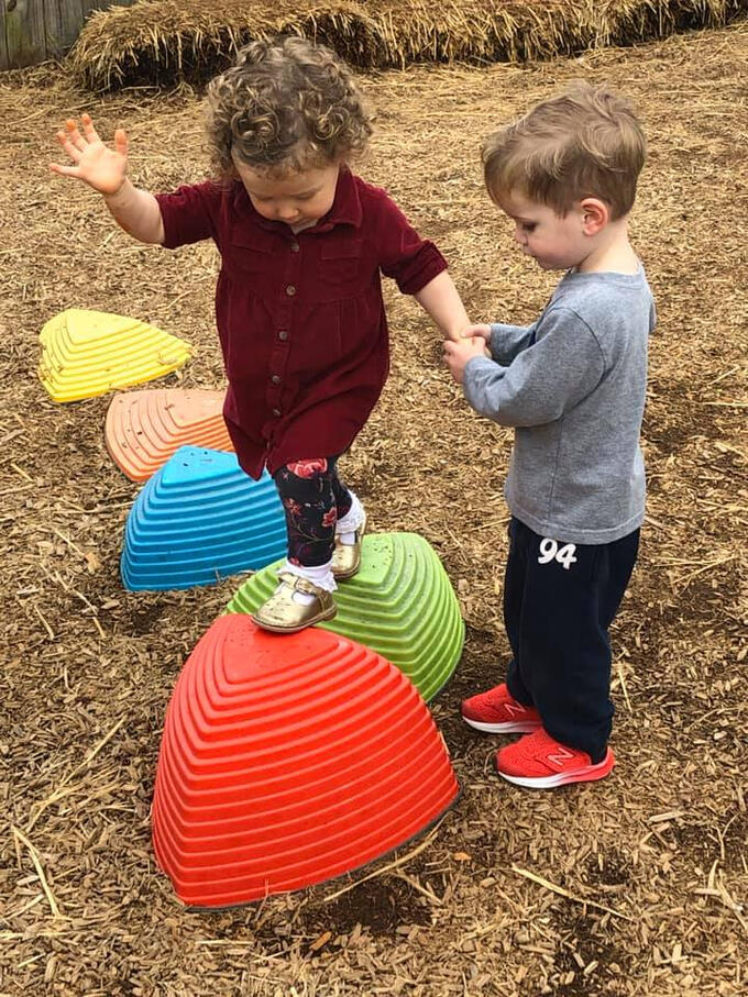 Shreveport Daycare kids helping each other